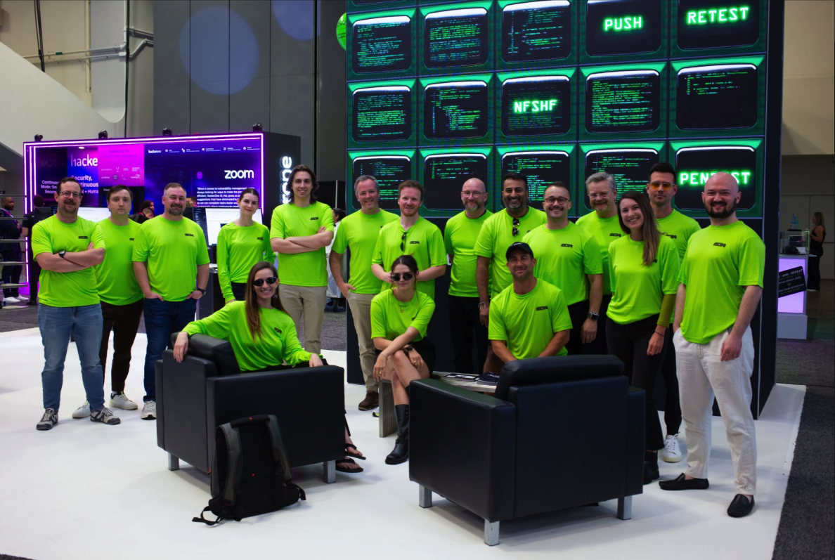 The Aikido Security team in matching branded shirts on the RSAC 2026 show floor, small, founder-led, and intentionally on-brand.